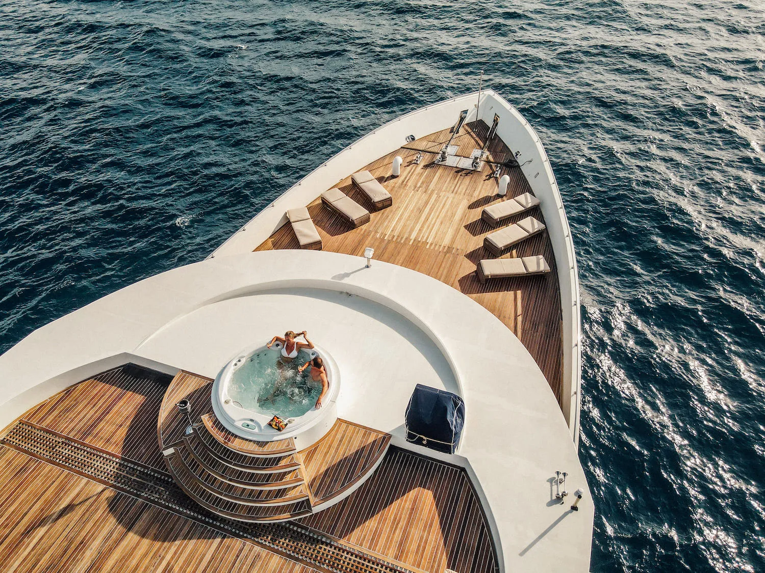 Couple enjoying a hot tub on Maldives yacht